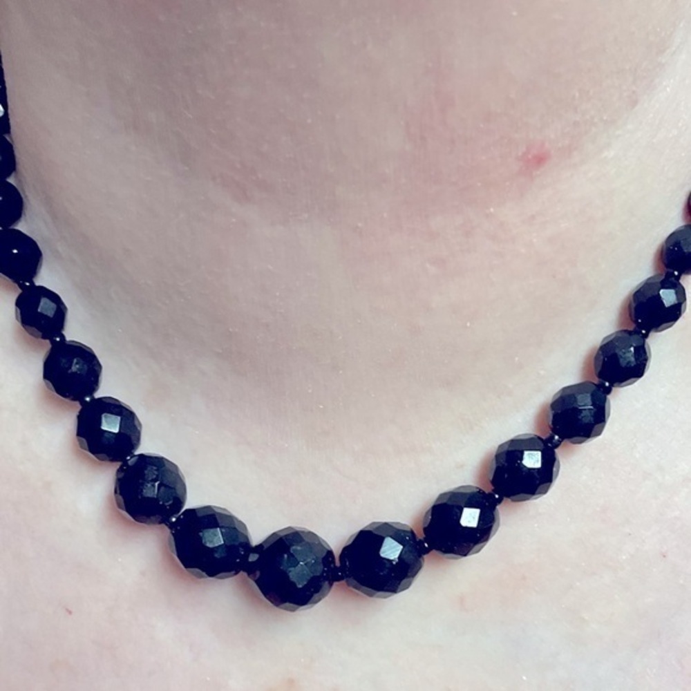 16" black graduated size beads necklace. 2 in stainless extender added if wanted
